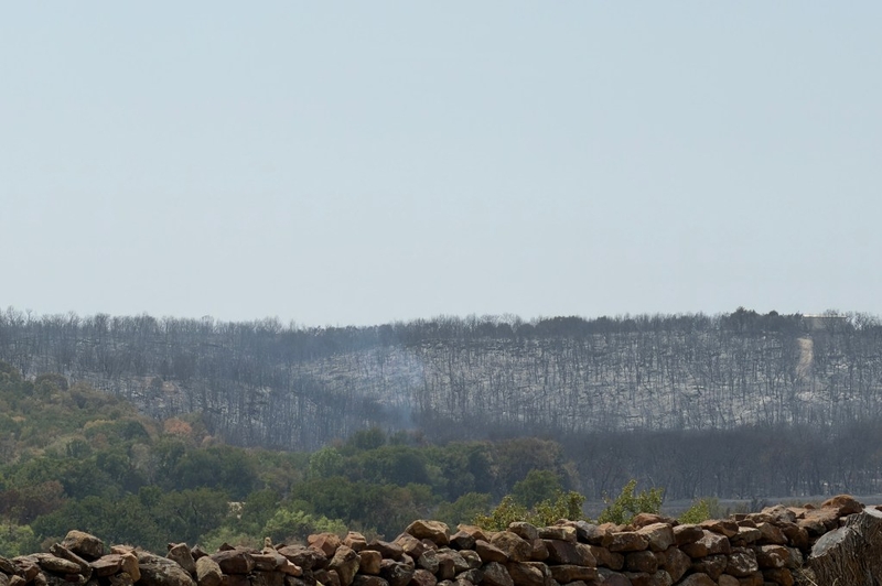 Fire crews fully contains North Texas wildfire, which continues to burn three weeks later