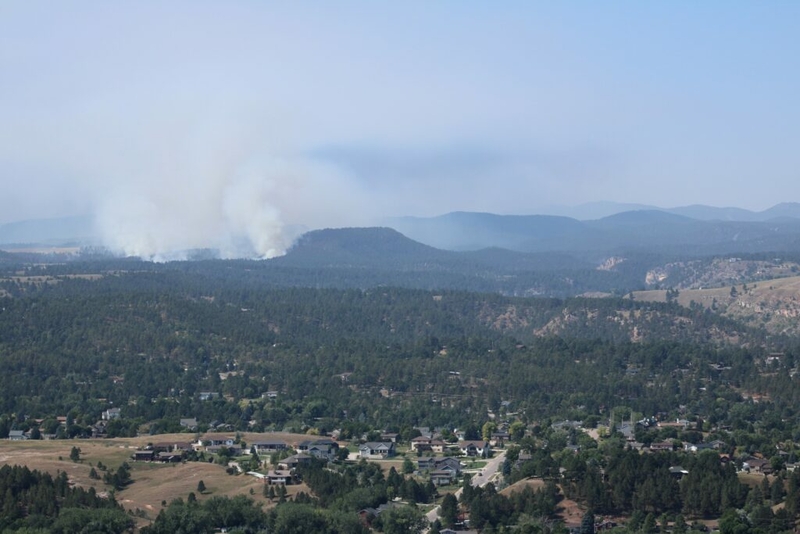 Wildfire burns west of Rapid City; residents urged to stay alert