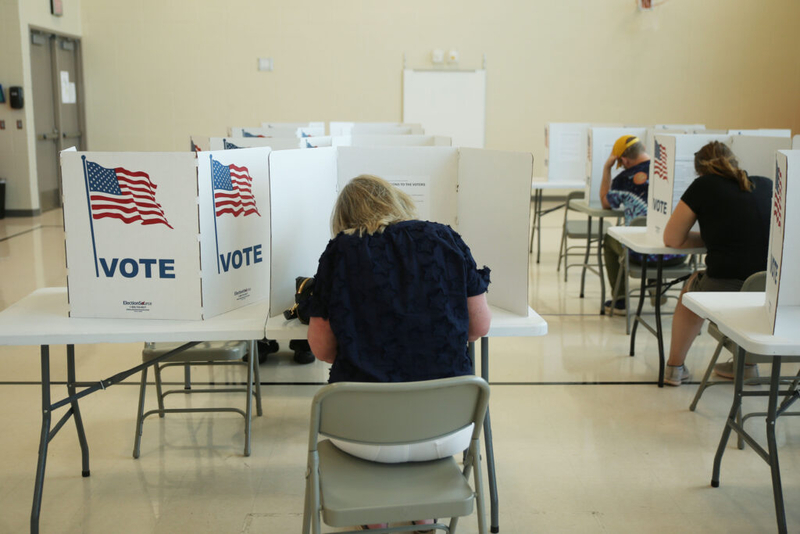Surge in advance voting for Republican runoff driven by party switchers, county auditors say