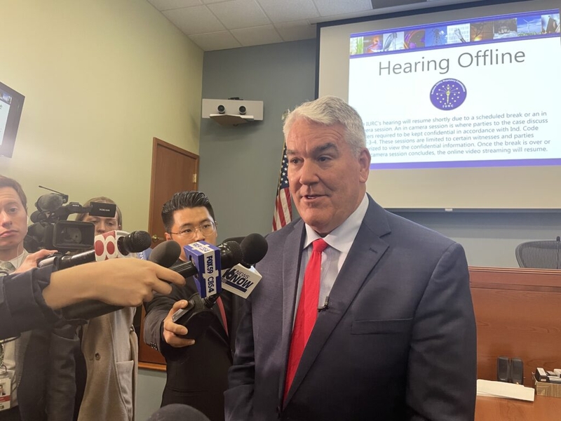 Fired Indiana utility regulator sues governor over his removal