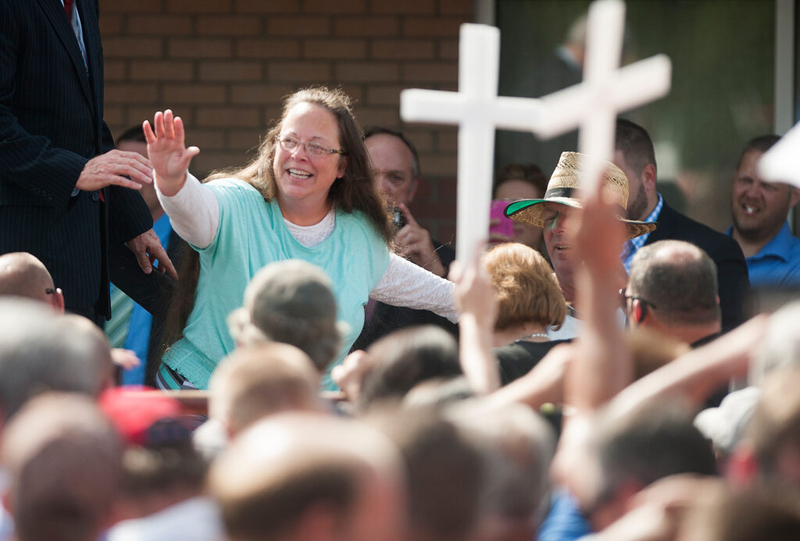 Couple denied wedding license by Kim Davis allege she has covered up assets owed them