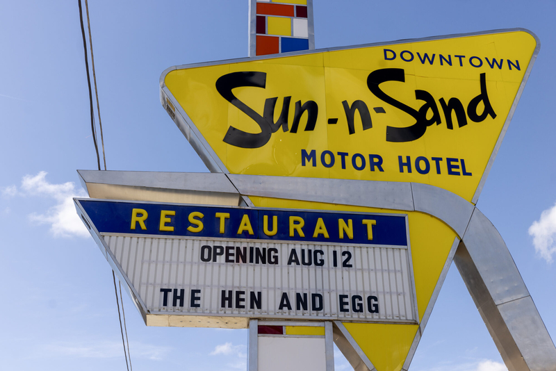 A sign outside the Sun-n-Sand Conference Center in Jackson, Miss., notes that the new Hen &amp; Egg restaurant will open Tuesday, Aug. 12, 2025. Credit: Eric Shelton/Mississippi Today