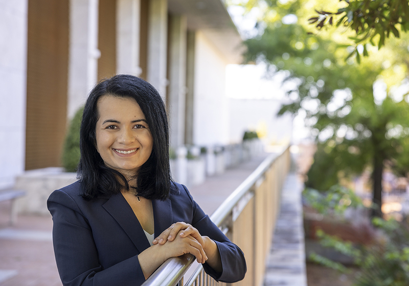 Once banned from education, she hid her books in a Quran. Now she holds a doctorate degree.