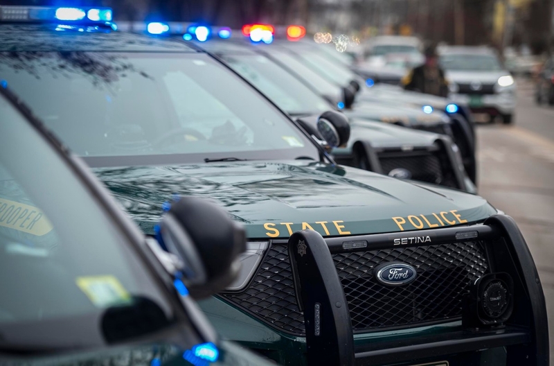 In latest attempt to charge March 11 ICE protesters, state police identify man accused of smashing police van window