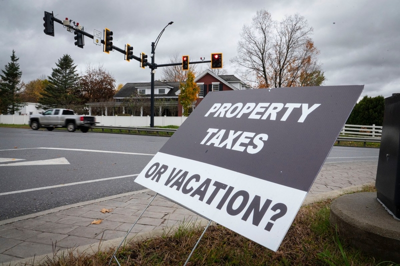 Gov. Scott put property taxes and school consolidation center stage. Now Amanda Janoo is rallying opposition.