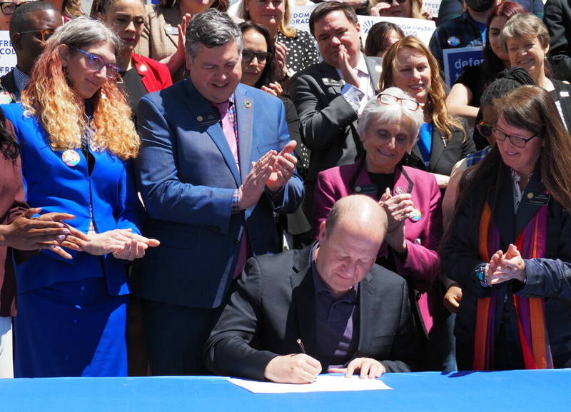 Repeal of state Constitution’s same-sex marriage ban heads to voters with Gov. Polis’ signature