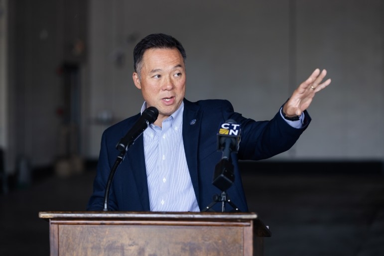 Attorney General William Tong speaks at a press conference in Stamford on July 16, 2025 to announce a lawsuit against the Trump administration's hold on federal FEMA funding that will impact a number of Connecticut projects. Credit: Shahrzad Rasekh / CT Mirror