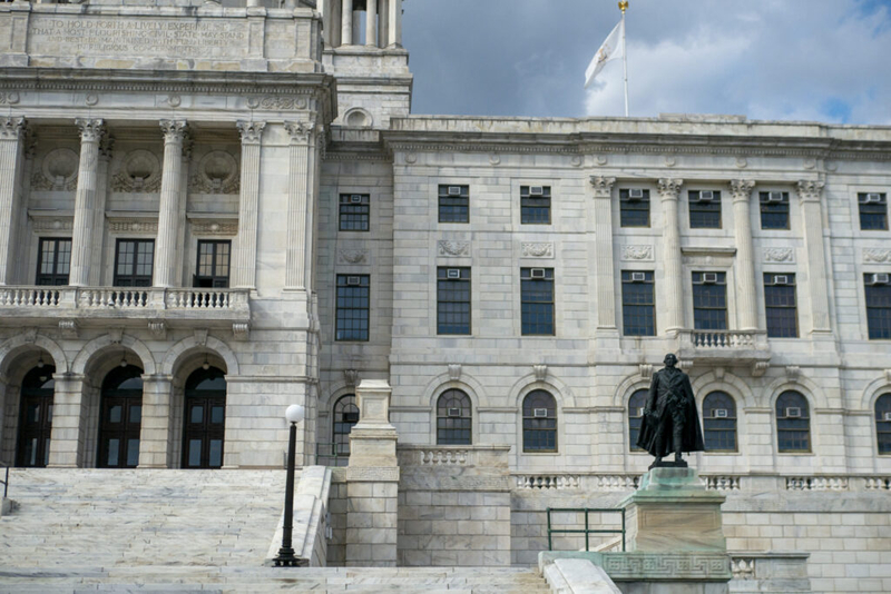 Former McKee adviser tied to ILO scandal exempt from lobbying rules, Amore’s office determines