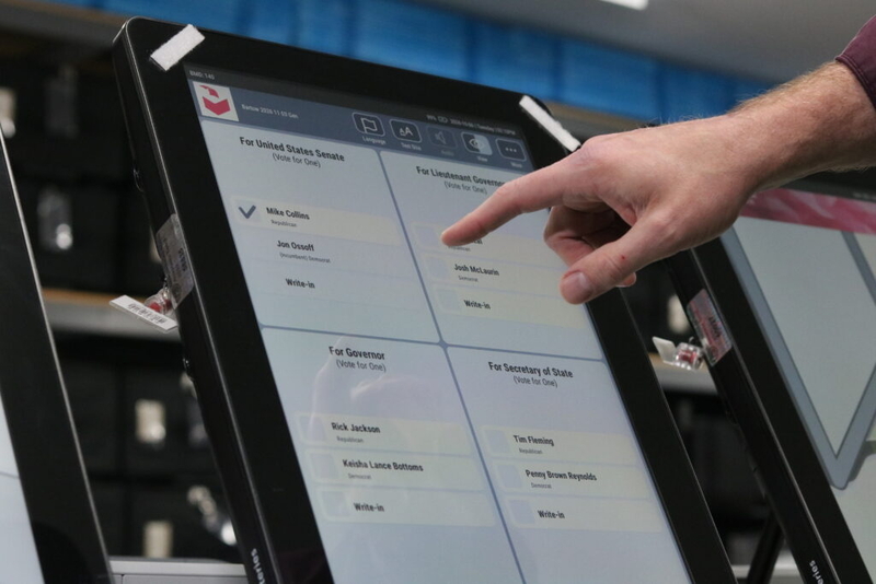 Election workers prepare for early voting as talk of DOJ ‘intervention’ leaves advocates unsettled