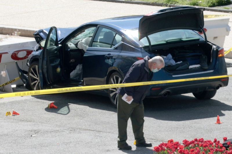 Police officer dead after suspect rams car into barricade outside U.S ...