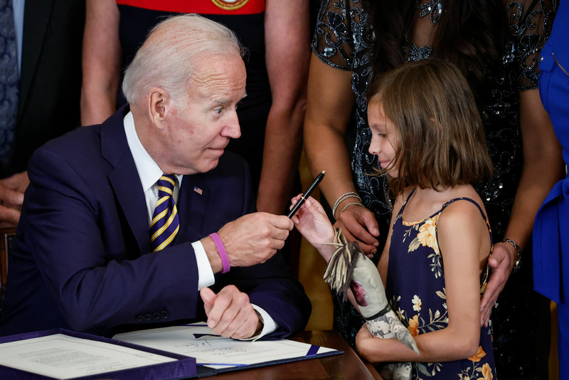 Biden signs landmark bill aiding veterans exposed to burn pits overseas