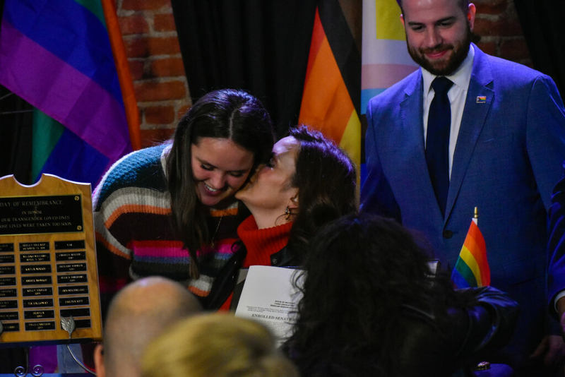 Whitmer signs LGBTQ+ non-discrimination bill into law alongside civil rights pioneer Mel Larsen