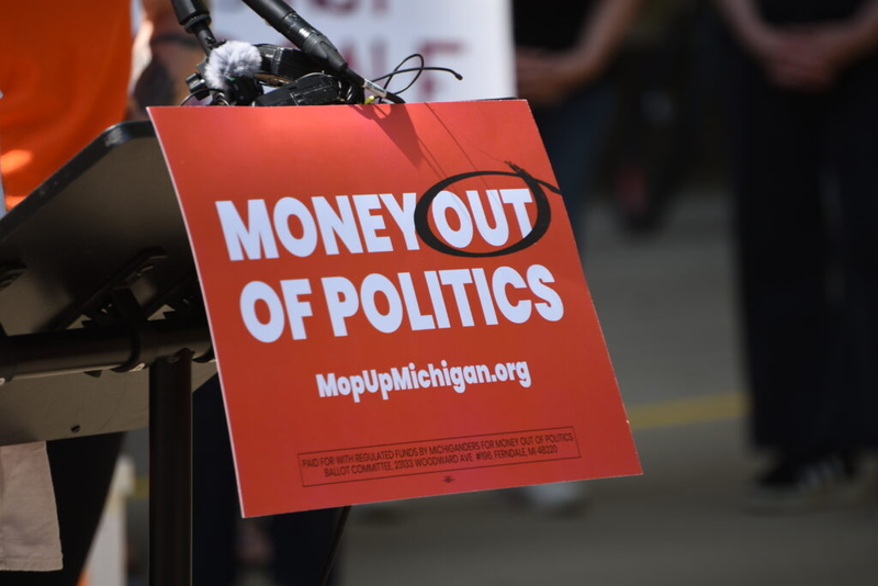 A ballot fight over corporate money in Michigan politics is coming to voters