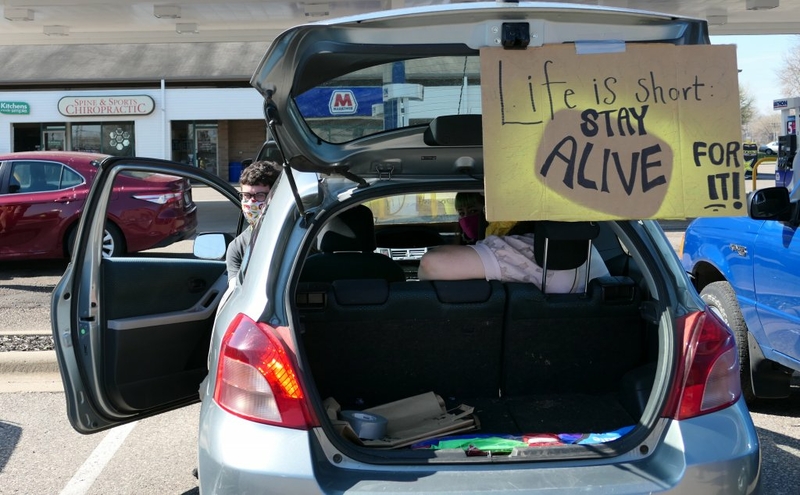 Demonstrators shut down Caribou drive-thru demanding worker protections