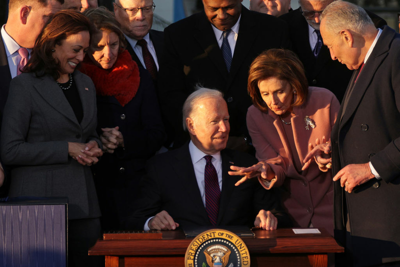 Biden signs $1.2T infrastructure bill: ‘America is moving again’