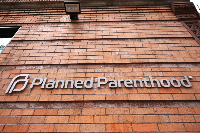 Planned Parenthood signage is seen in the Financial District neighborhood of Manhattan on April 16, 2021 in New York City. The Biden administration's Department of Health and Human Services has begun the process of undoing a Trump administration policy, known as Title X, that stripped federal family-planning dollars from clinics that refer patients for abortions, a move that drove Planned Parenthood to withdraw from the program. (Photo by Michael M. Santiago/Getty Images)
