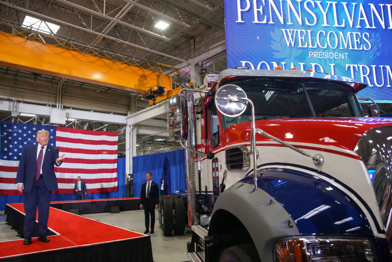 Trump campaigns with Mackenzie at Mack Trucks plant affected by tariff layoffs