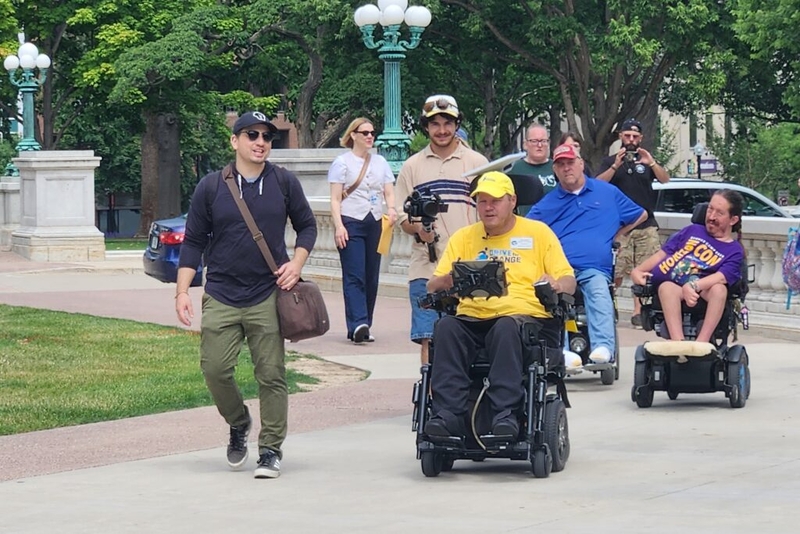 A wheelchair ride across Wisconsin calls attention to Medicaid cuts