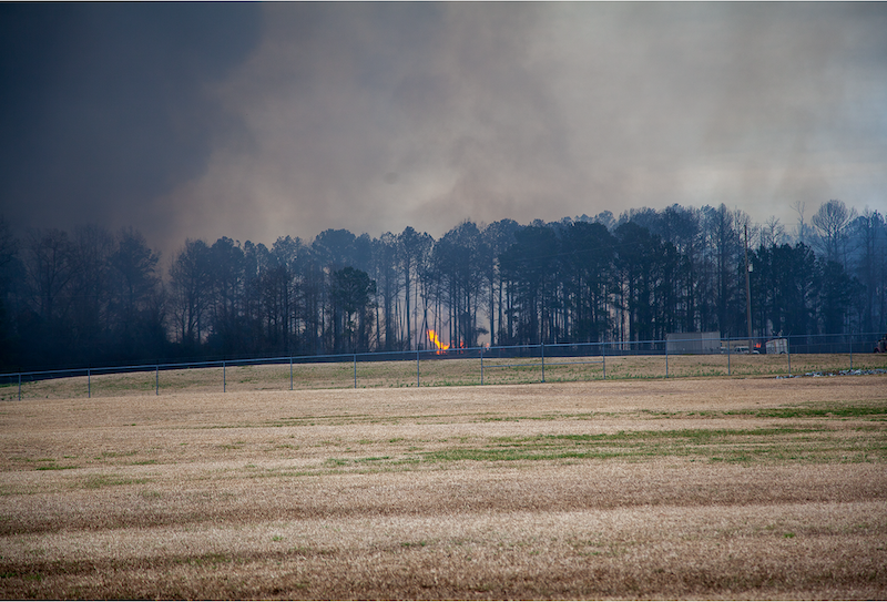 Dudley railroad tie fire was arson; DEQ requiring soil, ash sampling
