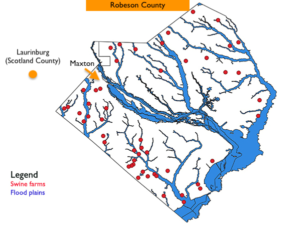 A map showing the locations of all hog farms throughout Robeson County and the flood plains. Most of the farms lie within the flood plains, including near the Lumber River. Maxton is in the western part of Robeson County, where Cardinal Bio-Energy wants to launch a pilot biogas program at as many as 28 farms in that part of the county.