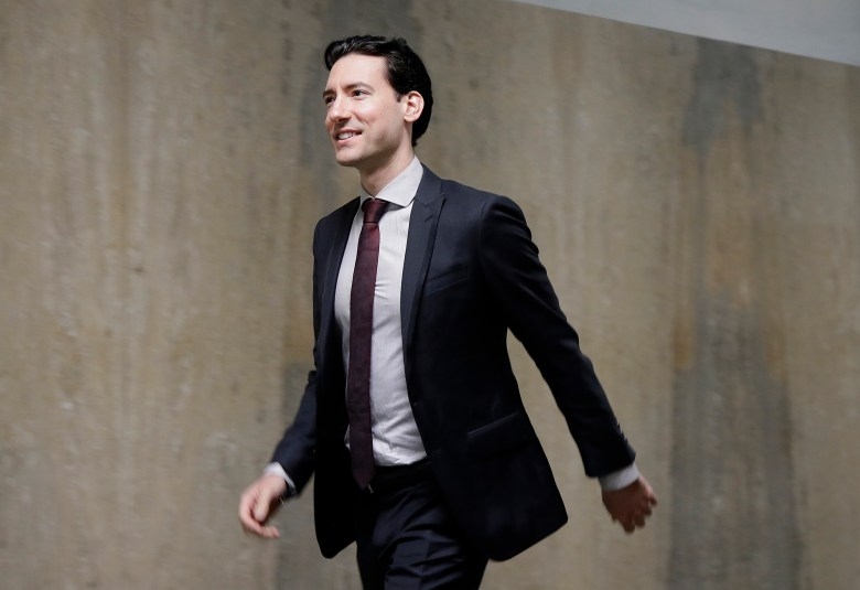 David Daleiden walks outside of a courtroom in San Francisco, Monday, Feb. 11, 2019. Planned Parenthood has made an unusual legal demand to join California's criminal prosecution of two anti-abortion activists charged with invasion of privacy for secretly making videos as they tried to buy fetal material from the organization.(AP Photo/Jeff Chiu)