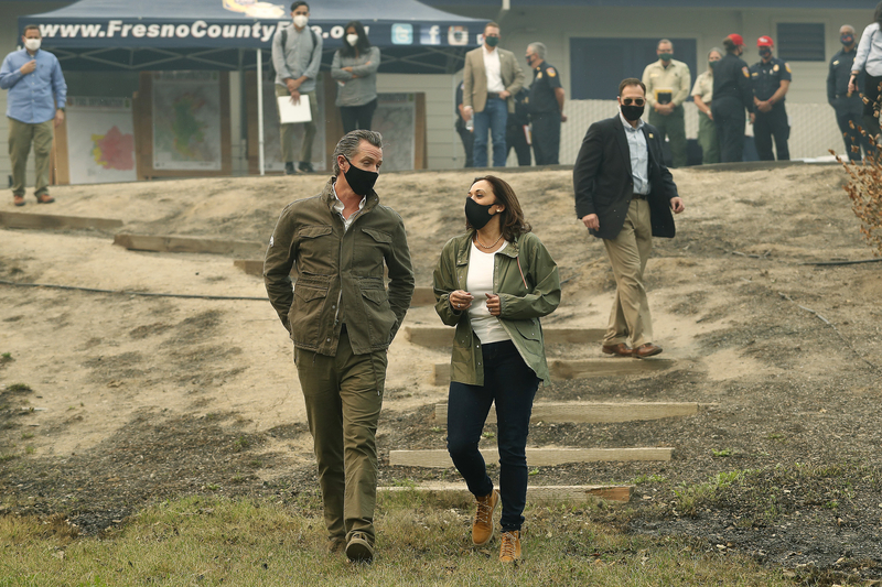 Gov. Gavin Newsom and Democratic vice presidential candidate Sen. Kamala Harris talk as they asses the damage during the Creek Fire at Pine Ridge Elementary on Sept. 15, 2020, in Auberry. Photo by Gary Kazanjian, AP Photo