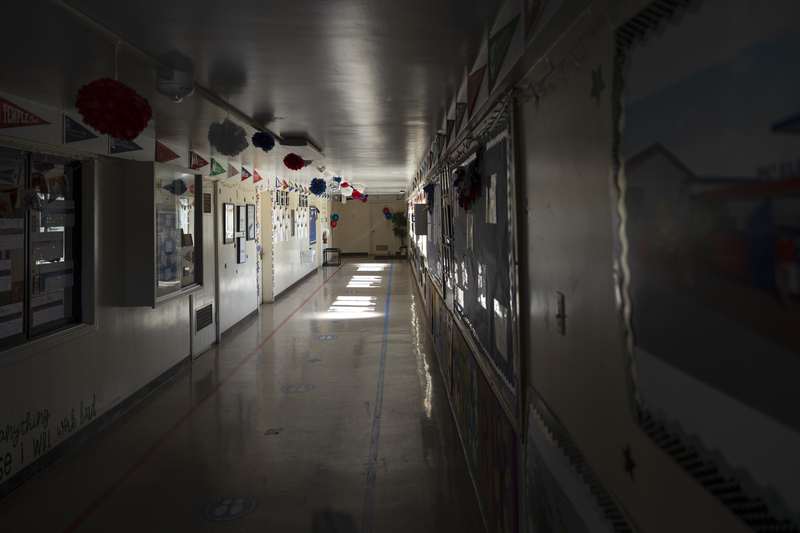 An empty hallway at St. HOPE’s Public School 7 Elementary in Sacramento on May 11, 2022. Photo by Miguel Gutierrez Jr., CalMatters