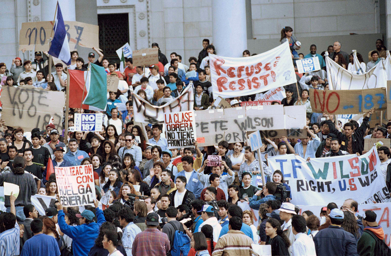 Hundreds of protesters gathered at Los Angeles City Hall to demonstrate against the so-called "Save Our State" proposition, Prop. 187 on Nov. 7, 1994. Photo by Nick Ut, AP Photo