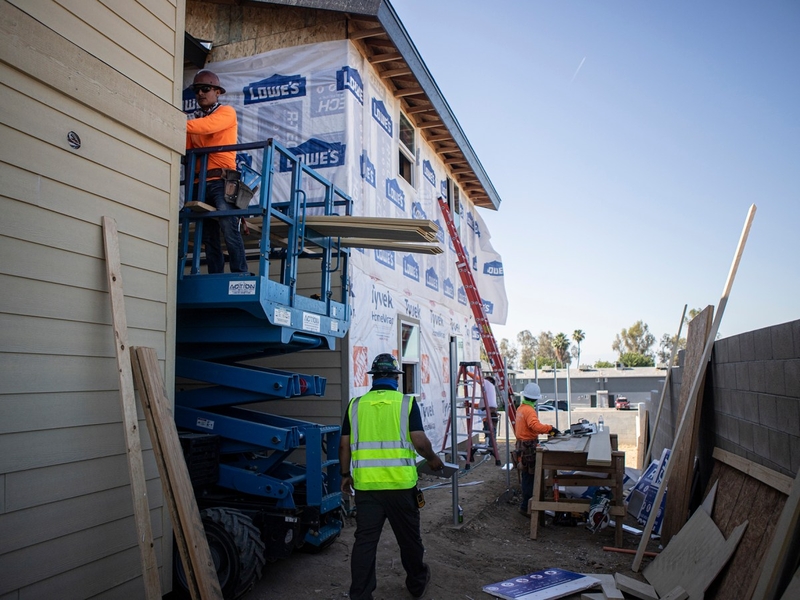 Construction workers building an apartment complex site for an affordable housing project in Bakersfield on May 29, 2024. Photo by Larry Valenzuela, CalMatters/CatchLight Local