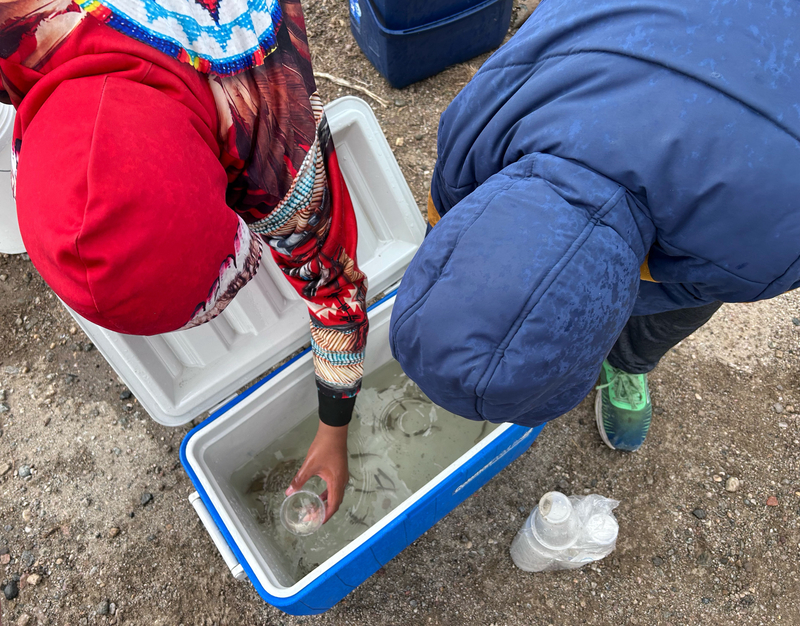 Tribal students in central Wyoming release small fish in a big pond