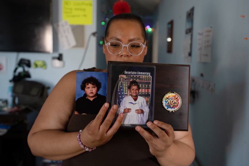 Gabrielle Jones-Radtke shows photos of her seven-year-old daughter Freyja, taken a year apart, in their home in El Paso, Texas on Saturday, February 28, 2026. Freyja suffers from Bardet-Biedl syndrome, which causes her excessive hunger due to a hormone imbalance, for which she is being treated with Imcivree, which isn’t accessible in Texas because its viewed as gender-affirming care.