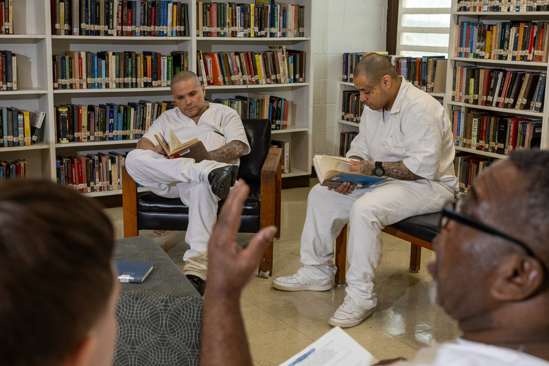 Inmates read books in the library of the TDCJ's Wynne Unit in Huntsville on May 21.