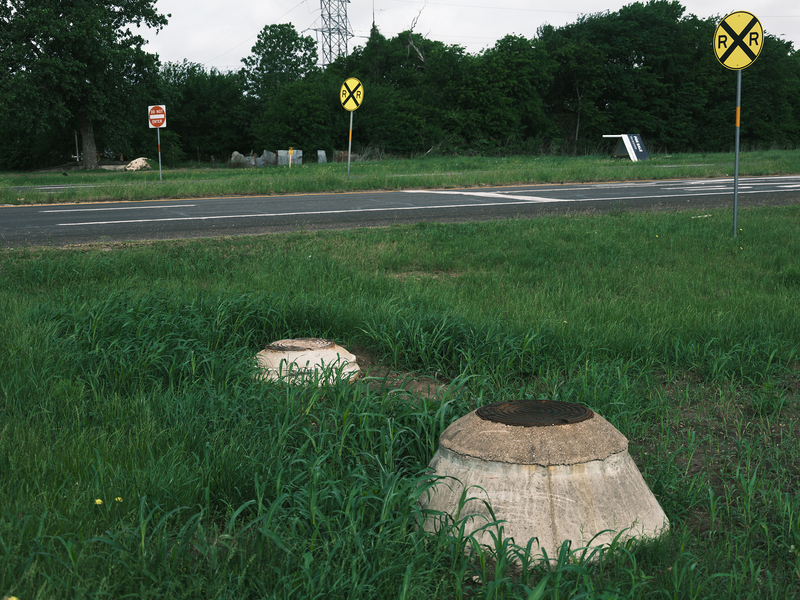 Cars often crash into raised manhole covers along Route 77 in Lacy Lakeview. The city would replace or relocate the manholes with additional tax revenue from the proposed Infrakey data center.