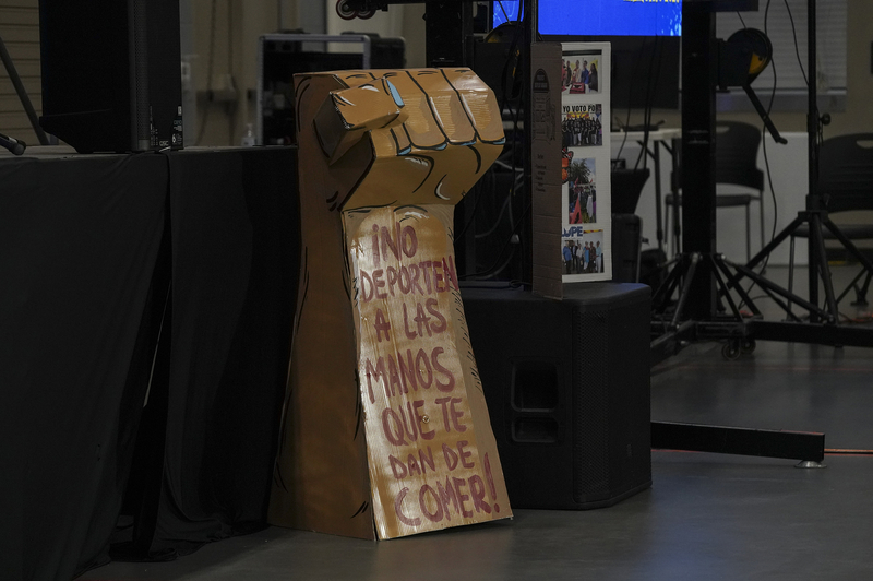 A gigantic three-dimensional cardboard fist with the message in Spanish that reads “Don’t deport the hand that feeds you” is seen during the La Unión del Pueblo Entero biennial Cumbre de Miembros 2026 at the Pharr Development and Research Center in Pharr, Texas on August 29, 2026.