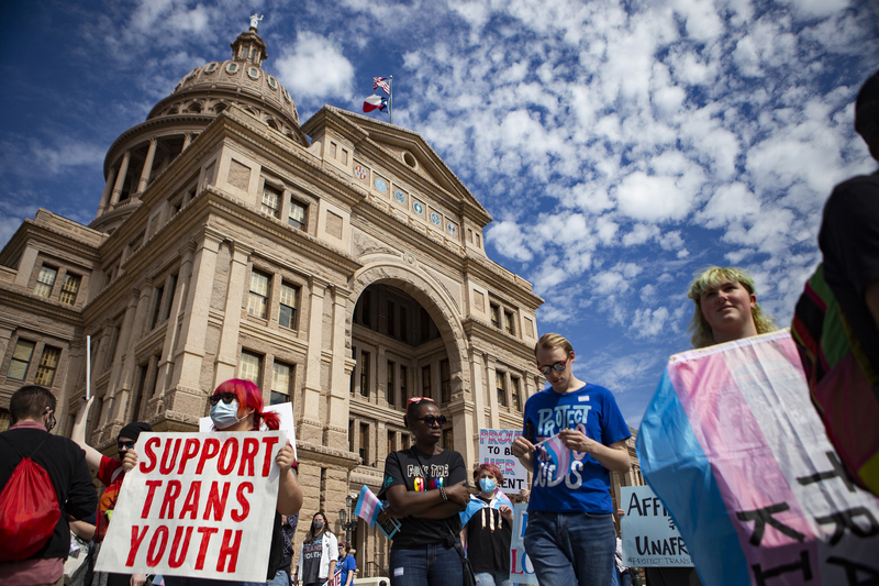 Demostrators gather in front of the Texas Capitol during a protest for transgender kids' rights on Mar. 1, 2022.