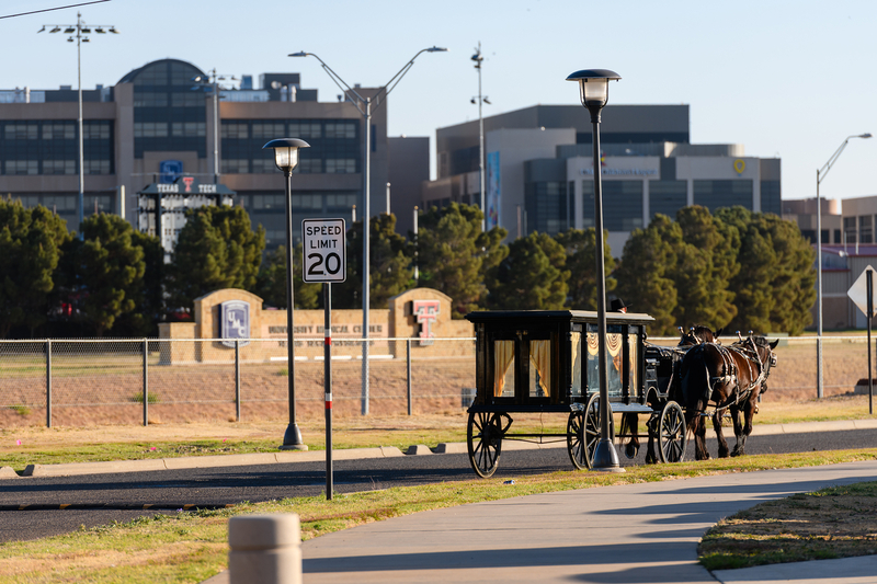 A horse-drawn black hearse was part of the mock funeral staged on Texas Tech's campus.