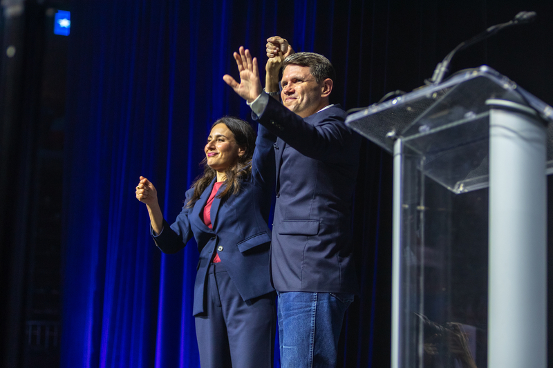 U.S. Senate candidate James Talarico (right) and Democratic nominee for governor Gina Hinojosa wave to the crowd at the Texas Democratic Convention in Corpus Christi on June 26, 2026.