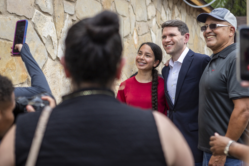 State Rep. and Democratic nominee for U.S. Senate James Talarico shakes hands and introduces himself to South Texans while waiting outside Memo’s restaurant during a campaign stop in Del Rio on July 13, 2026.