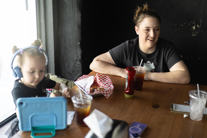 Joie Miller speaks with Caitlin Rourk over lunch Navasota on Oct. 8, 2026. Roark is the Democratic nominee for Congress in Texas' largely rural 10th Congressional District.