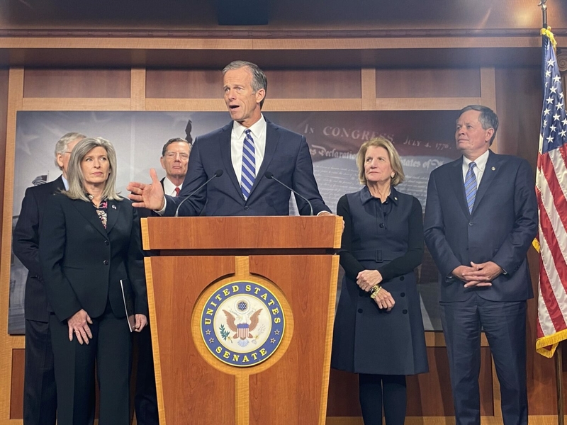 Sen. John Thune, R-South Dakota, speaks at a press conference in late 2022 following Senate Republicans' vote on their leadership for the next Congress. From left are GOP Sens. Mitch McConnell, Joni Ernst, John Barrasso, John Thune, Shelley Moore Capito and Steve Daines. (Photo by Jennifer Shutt/States Newsroom)