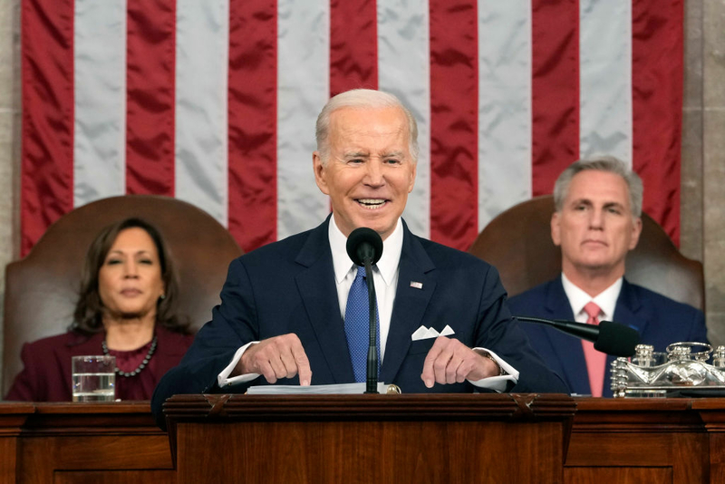 U.S. President Joe Biden delivers the State of the Union address to a joint session of Congress as Vice President Kamala Harris and House Speaker Kevin McCarthy listen on Feb. 7, 2023, in the House Chamber of the U.S. Capitol in Washington, D.C.(Photo by Jacquelyn Martin-Pool/Getty Images)