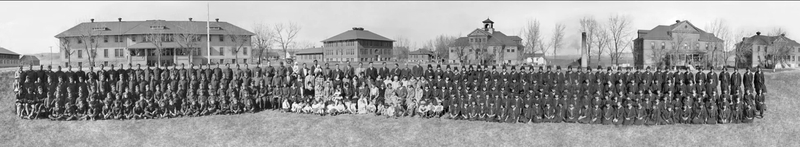 Kibbe Brown's aunt who attended the Rapid City Indian School had saved a panoramic photo of students and staff from between 1925 and 1927, with the school's campus in the background. (Photo courtesy of Remembering the Children)