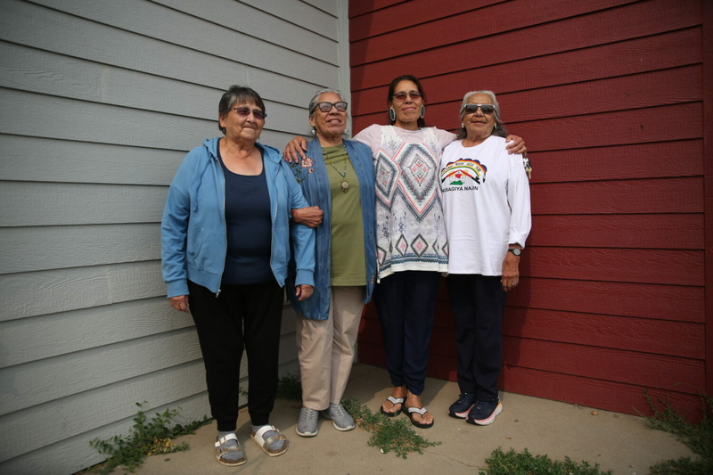 Four members of the Cheyenne River Waśagiya Najin grandmother group in Eagle Butte on Sunday, July 16, 2023: (left to right) Leslie Vermillion, Madonna Thunder Hawk, Marcella Gilbert, and Mable Ann Hunter. (Makenzie Huber, South Dakota Searchlight)