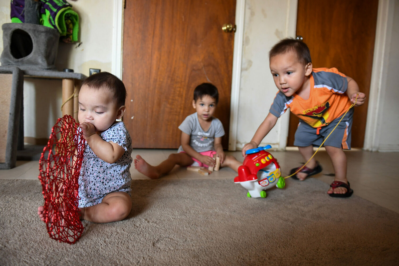 Jewel Bruner's grandchildren play in her living room on Wednesday, September 20, 2023 in Eagle Butte, South Dakota. (Samantha Laurey, Argus Leader)