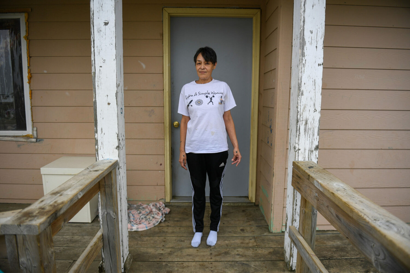 Jewel Bruner stands on the front patio of her Eagle Butte home on Sept. 20, 2023. (Samantha Laurey/Argus Leader)