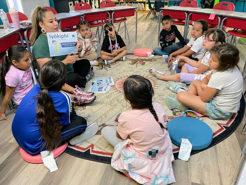 Frances Dupris teaches students on Aug. 29, 2024, at the Oceti Sakowin Community Academy in Rapid City, South Dakota. (Seth Tupper/South Dakota Searchlight)