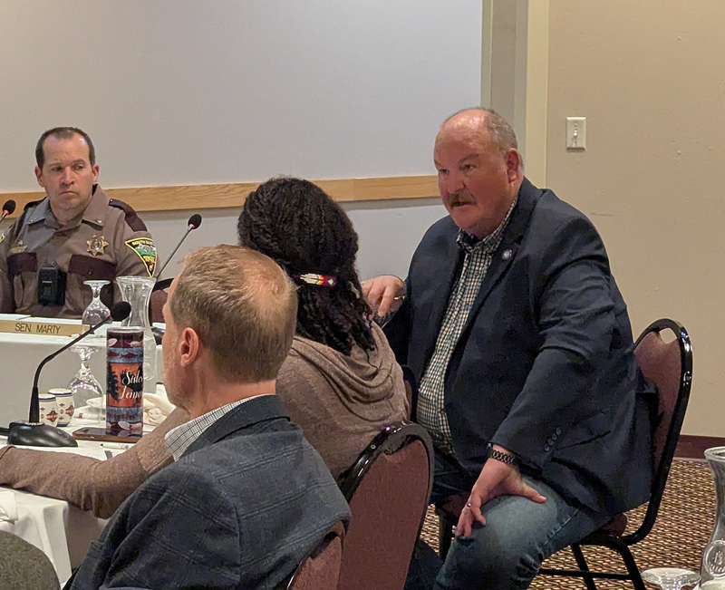 South Dakota Division of Criminal Investigation Director Dan Satterlee speaks to the State-Tribal Relations Committee on Sept. 19, 2025, in Mobridge. At left is Highway Patrol Lt. Caleb Walters. (John Hult/South Dakota Searchlight)