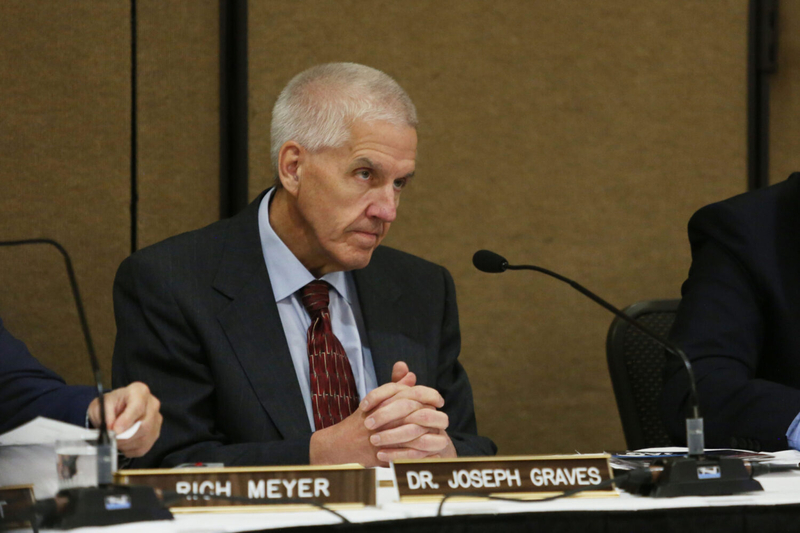 South Dakota Department of Education Secretary Joseph Graves listens to testimony during a state Board of Education Standards meeting on Nov. 10, 2025, in Sioux Falls. (Photo by Makenzie Huber/South Dakota Searchlight)