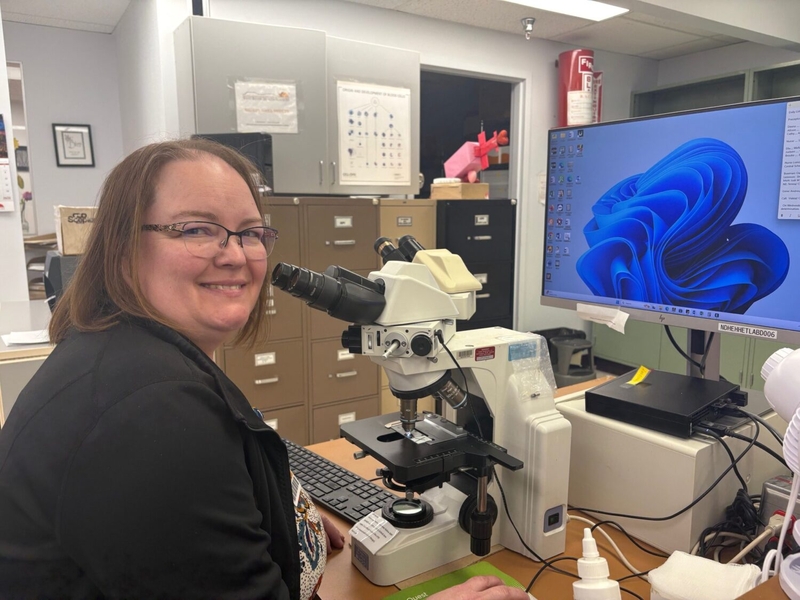 Bekki Holzkamm, lab manager at West River Health Services in rural North Dakota, has been trying to hire a technician since late summer. But not one U.S. citizen has applied. West River will have to pay a new $100,000 H-1B visa fee — or request an exemption — if it wants to hire one of its foreign applicants. (Kathrine Abelita)
