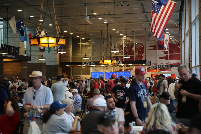 Crowds gathered in the cafeteria at Mount Rushmore National Memorial during inclement weather at South Dakota's Freedom 250 Mount Rushmore Fireworks Celebration on July 3, 2026. (Photo by Meghan O'Brien/South Dakota Searchlight)